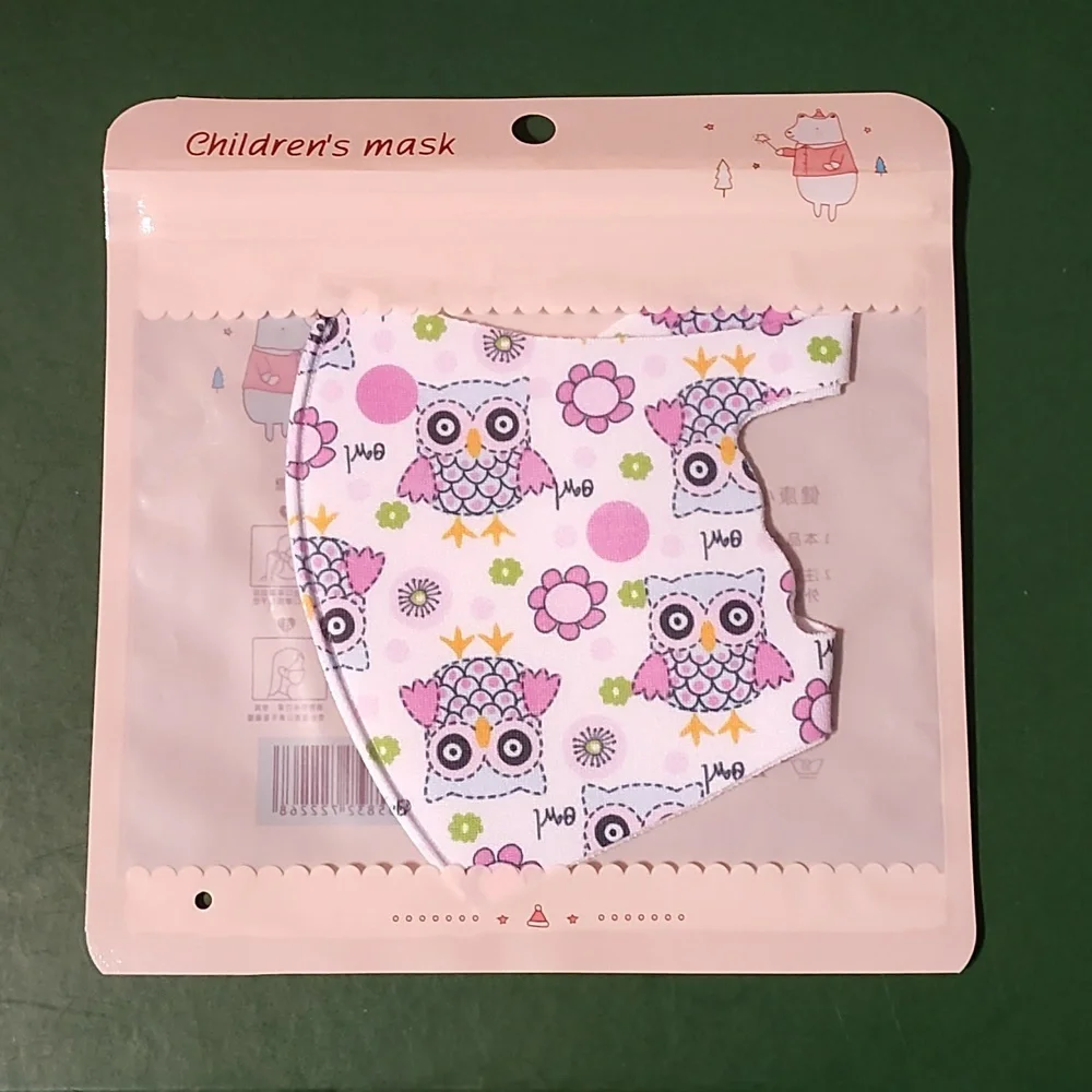 Children's re Usable face mask new in package never opened